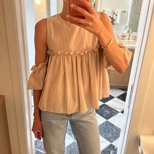 Storets beige blouse with empire ruffle. Bare shoulders